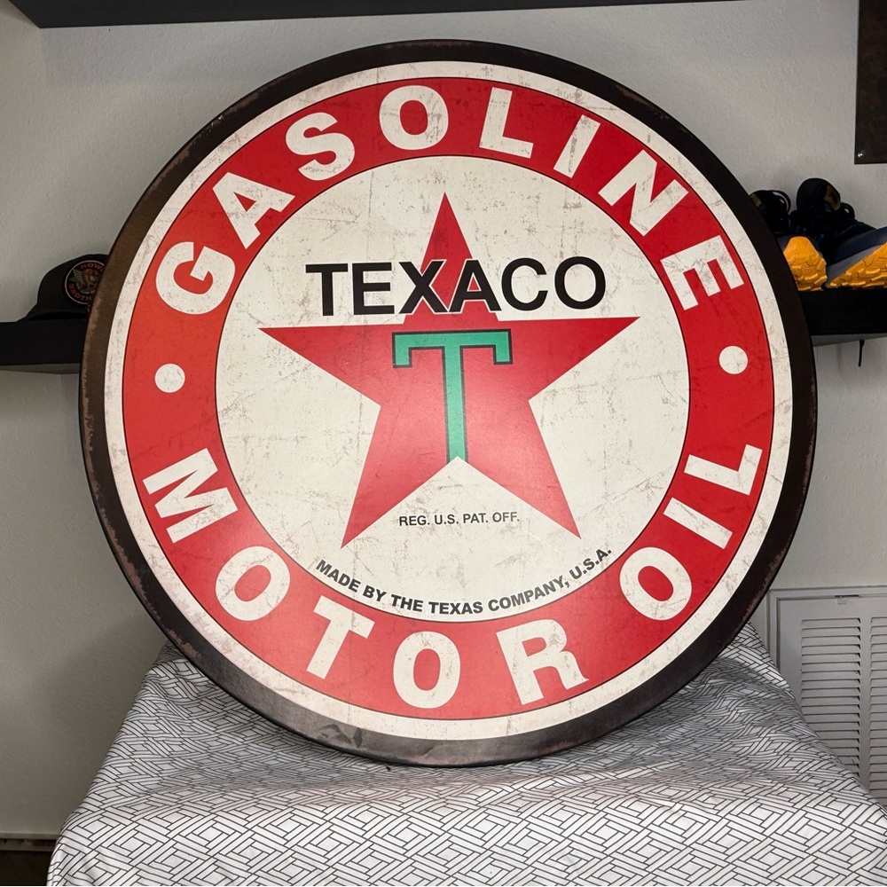 Red and White Gasoline Motor Oil Wall Sign